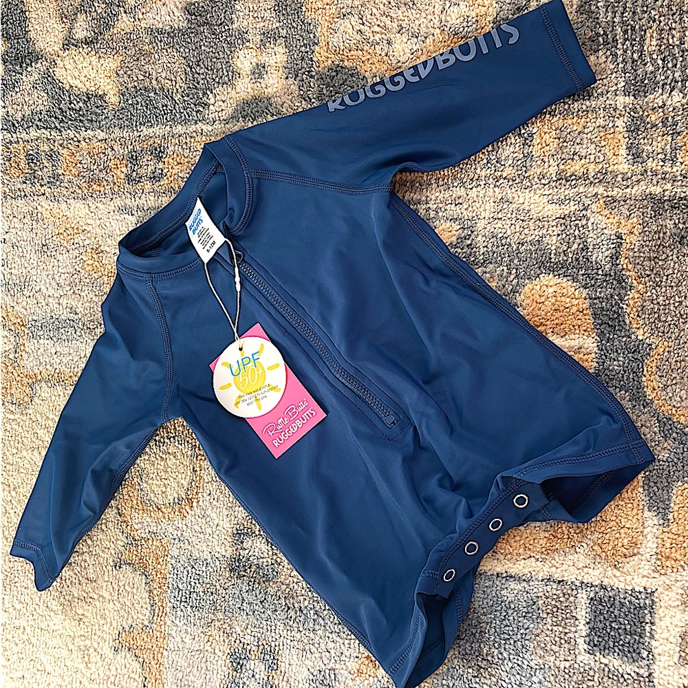 Brand new with tags long sleeve one piece rash guard size 6-12months